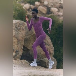 NWOT Free People FP Movement Good
Karma Corset Long Sleeve Onesie 💕